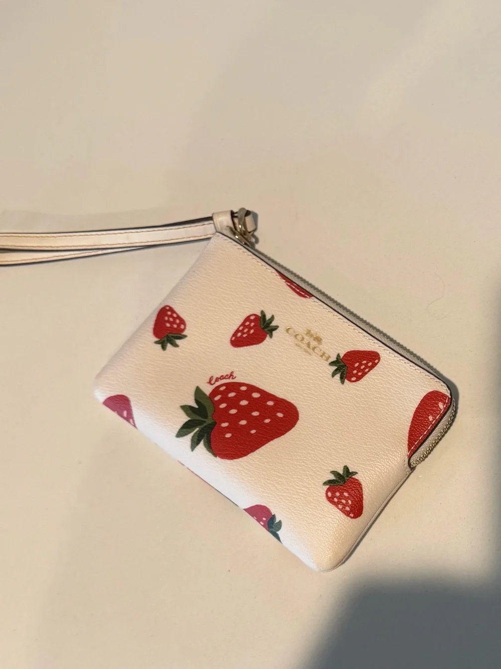 Coach White Strawberry Print Wristlet with Red and Green Accents